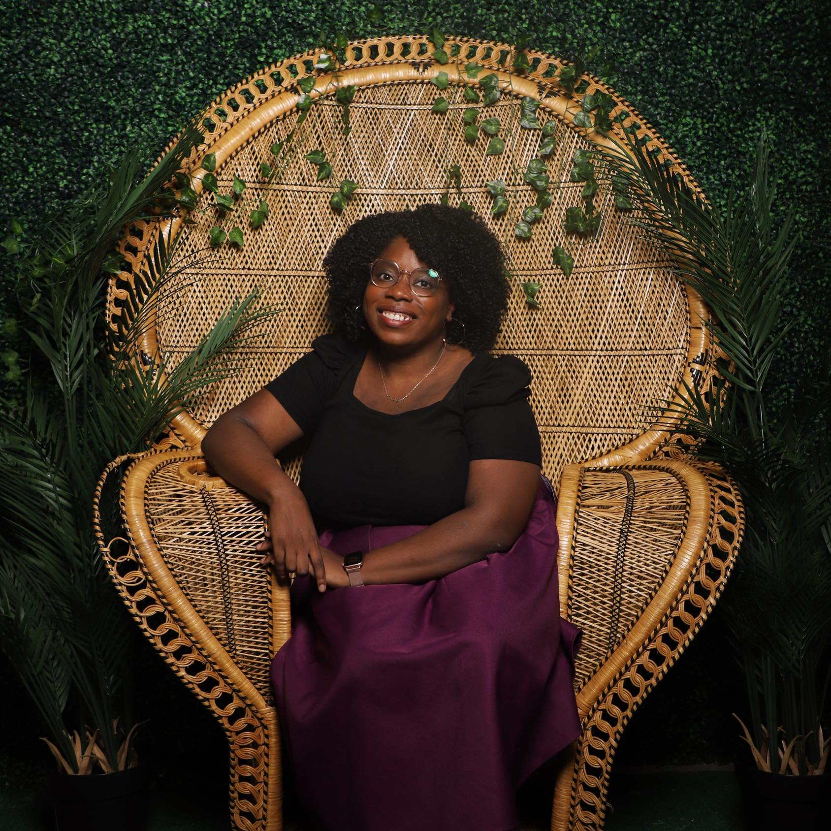 Sinovia Mayfield in professional setting - Project Manager and Digital Strategist